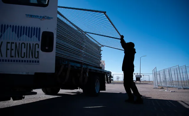 A contractor loads fencing onto a truck bed March 27, 2020, at Schriever Air Force Base, Colorado. The fencing was used to block off the gas pumps at the Schriever Express while they were under construction. (U.S. Air Force photo by Airman Amanda Lovelace). How much a fence contractor business costs to open, and who lends for it