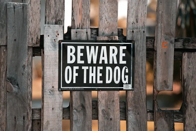 sign, fence, beware of the dog, gate, neighborhood, property, board fence. Which permits a fence contractor business needs before opening in 2027